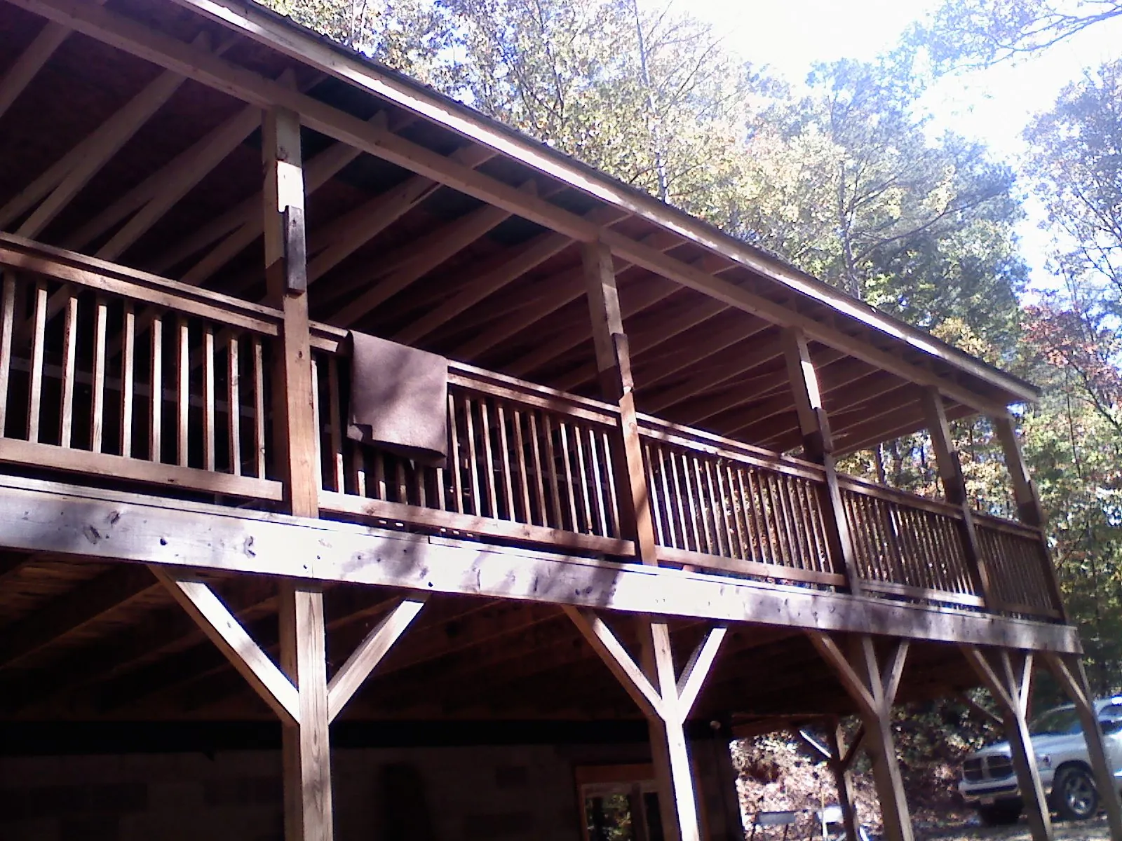 Timber framing under a new elevated porch and deck — Roof Leak Repair in Ellisville by Roofing Brothers
